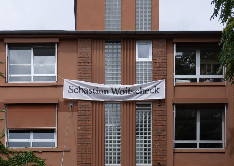 one of the two smaller  10x1 meter banners presenting Sebastian Woitscheck for Rundgang of Hochschule für Gestaltung Offenbach in Geleitstraße